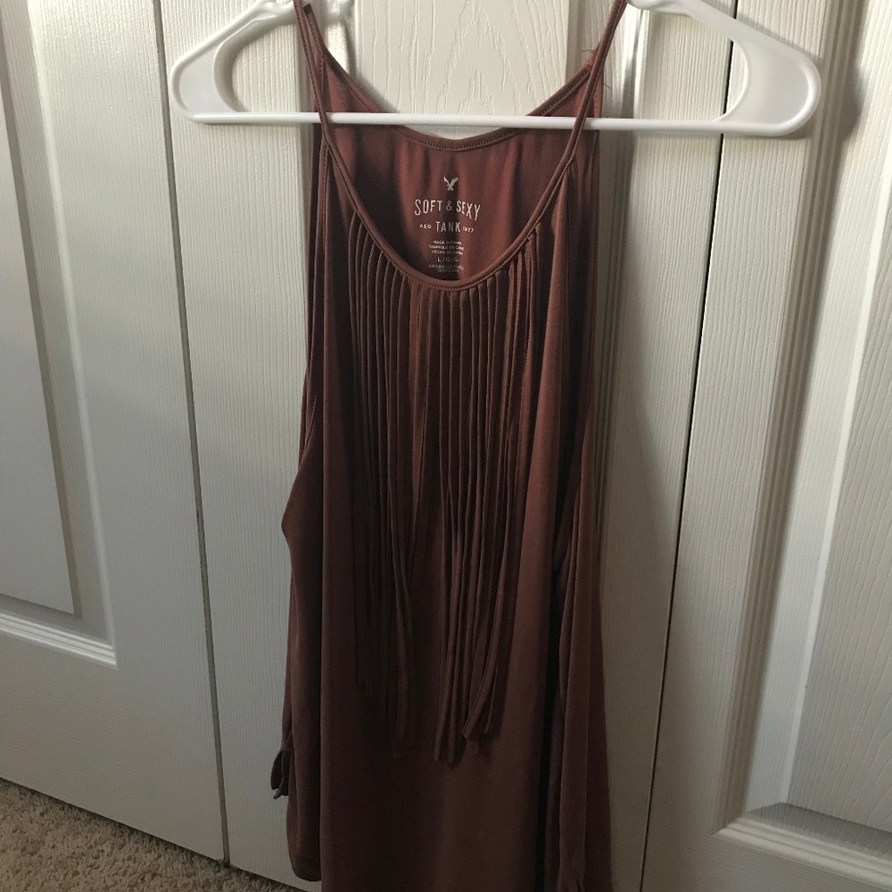 Beige women's tank top with tassals